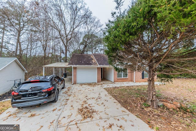 ranch-style home featuring a carport and a garage