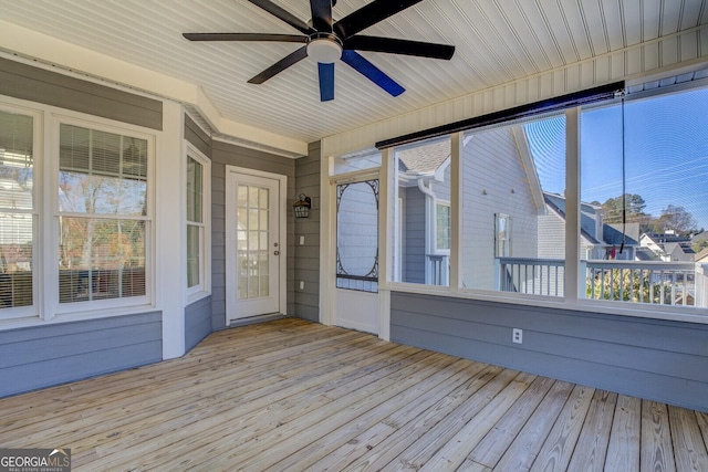 1103 Etowah Valley Ln, Woodstock, GA 30189 - unfurnished sunroom featuring ceiling fan and a wealth of natural light