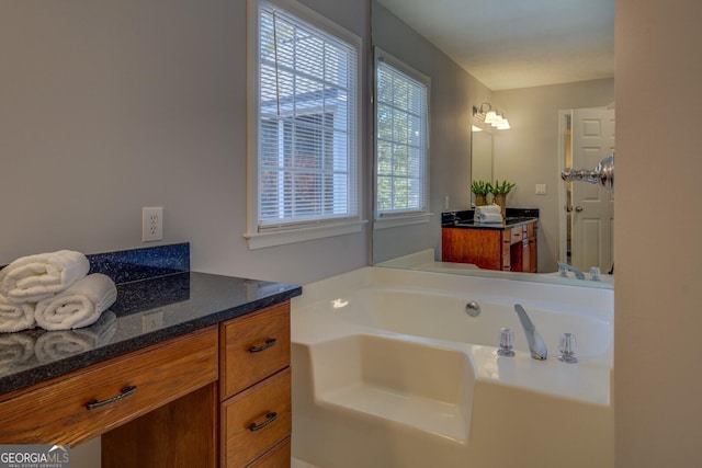 1103 Etowah Valley Ln, Woodstock, GA 30189 - bathroom featuring a bathtub and vanity