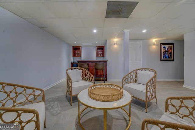 1103 Etowah Valley Ln, Woodstock, GA 30189 - sitting room with light carpet, a drop ceiling, and indoor bar