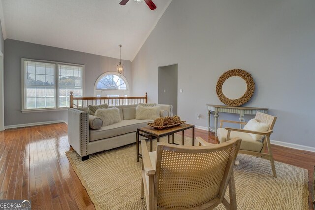 1103 Etowah Valley Ln, Woodstock, GA 30189 - living room featuring light hardwood / wood-style floors, high vaulted ceiling, and ceiling fan