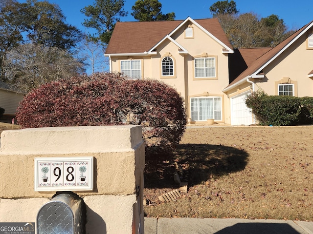 view of front of house with a garage