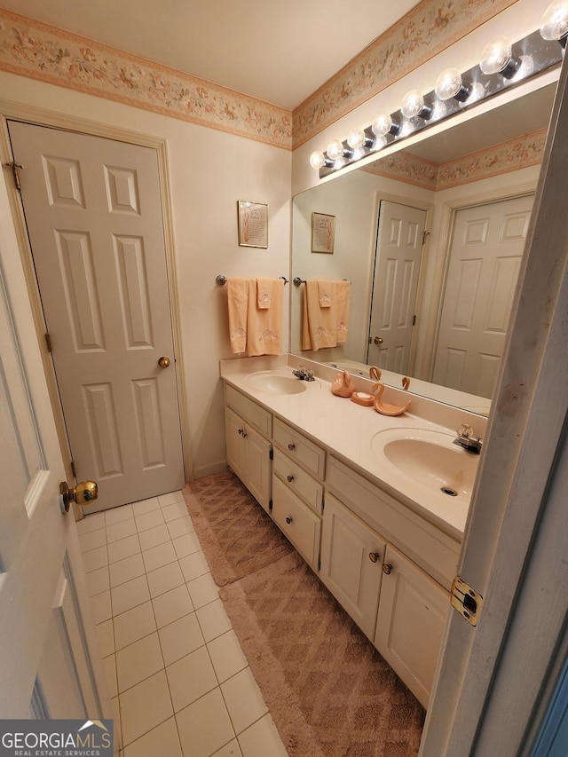 bathroom featuring tile patterned floors and vanity