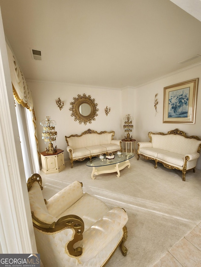 interior space with tile patterned floors and ornamental molding