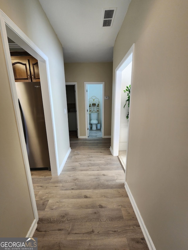 hall featuring light hardwood / wood-style flooring