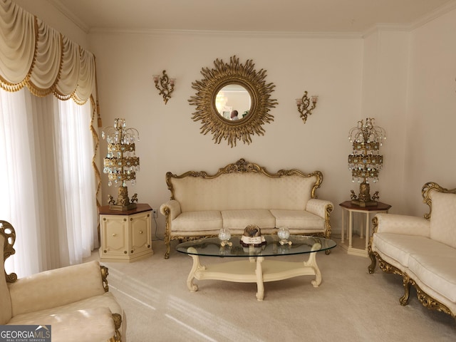 sitting room with carpet flooring and crown molding