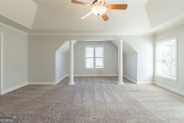 bonus room featuring vaulted ceiling, light carpet, and ornate columns