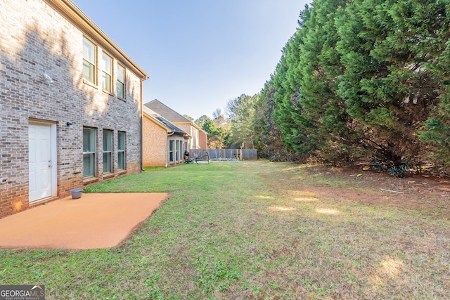 view of yard featuring a patio area