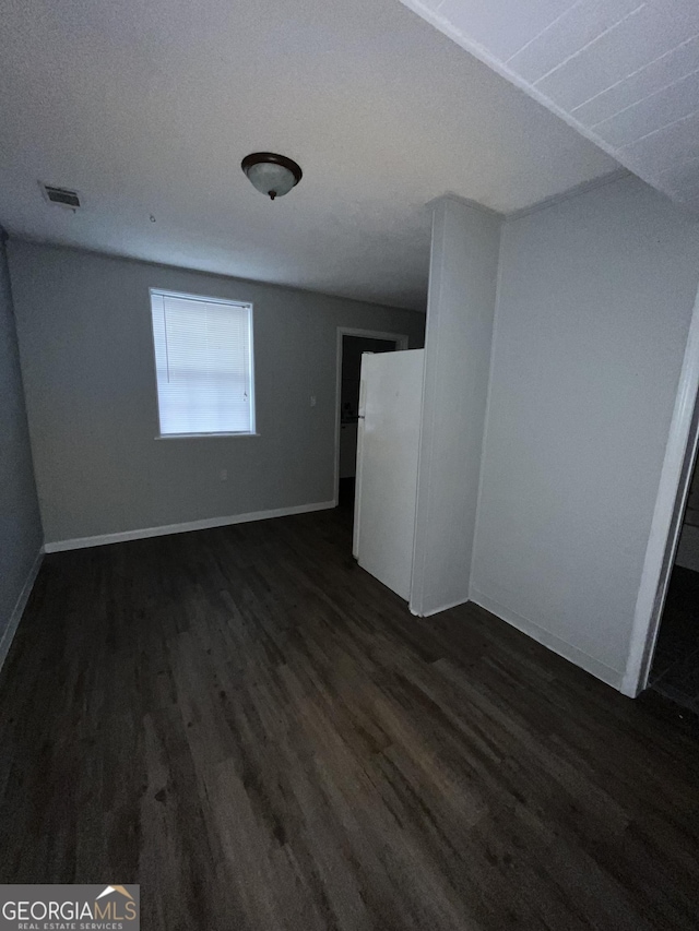 interior space featuring dark wood-type flooring