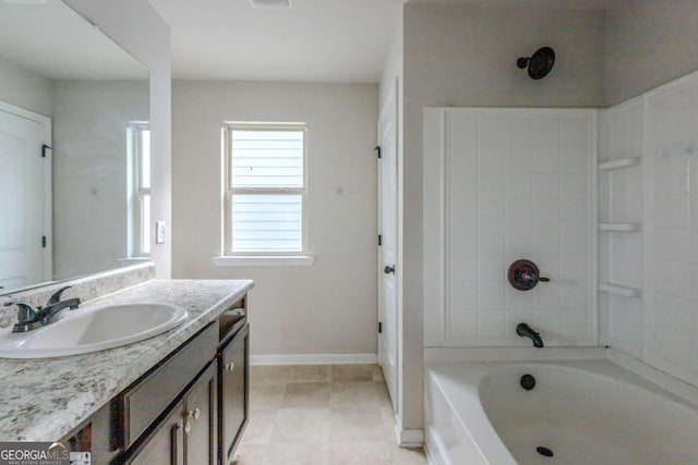 bathroom featuring vanity and bathing tub / shower combination