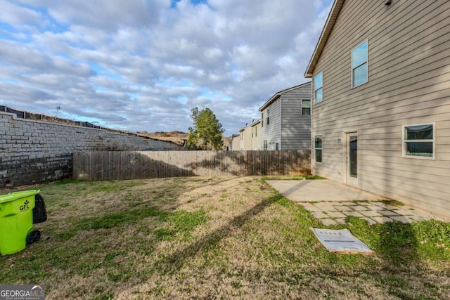 view of yard with a patio area