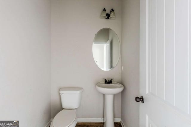 bathroom featuring toilet