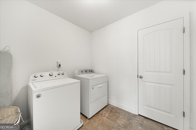 laundry room with washing machine and dryer