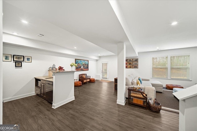 living room featuring dark hardwood / wood-style floors