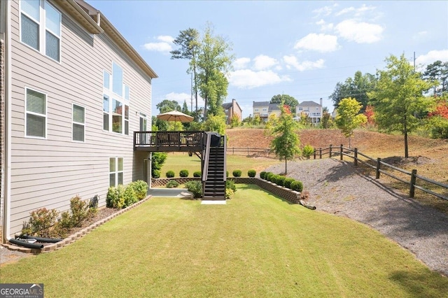 view of yard featuring a deck