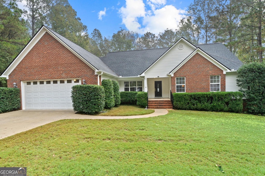 view of front of home with a front yard