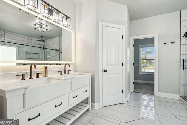 bathroom featuring vanity and a shower with shower door