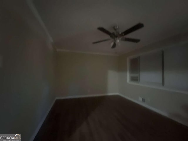 empty room with wood-type flooring and ceiling fan