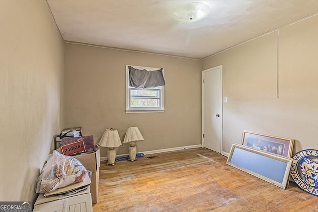 miscellaneous room featuring hardwood / wood-style floors