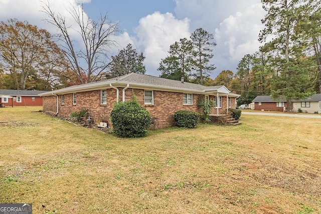 view of property exterior featuring a lawn