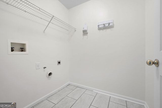 washroom with hookup for a gas dryer, hookup for a washing machine, and electric dryer hookup