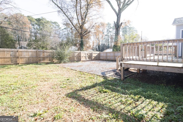 view of yard with a deck