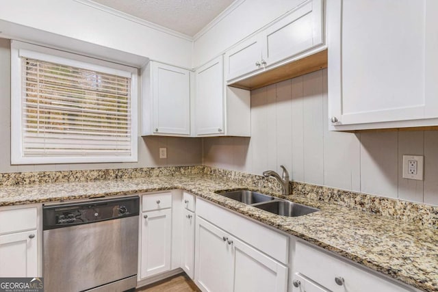 kitchen with dishwasher, sink, light stone countertops, a textured ceiling, and white cabinetry