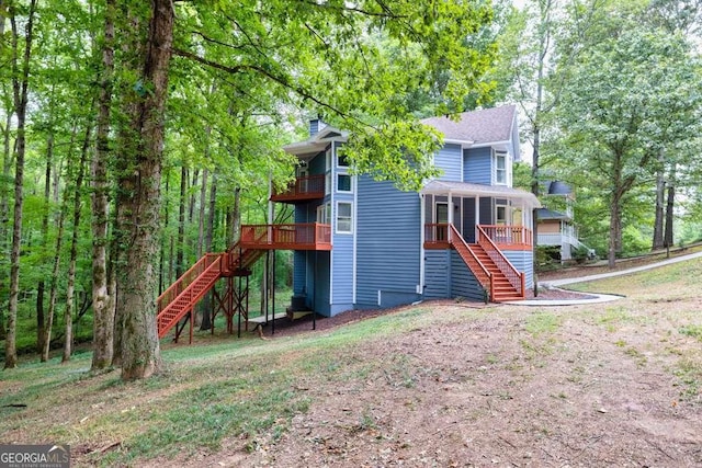 view of playground with a sunroom