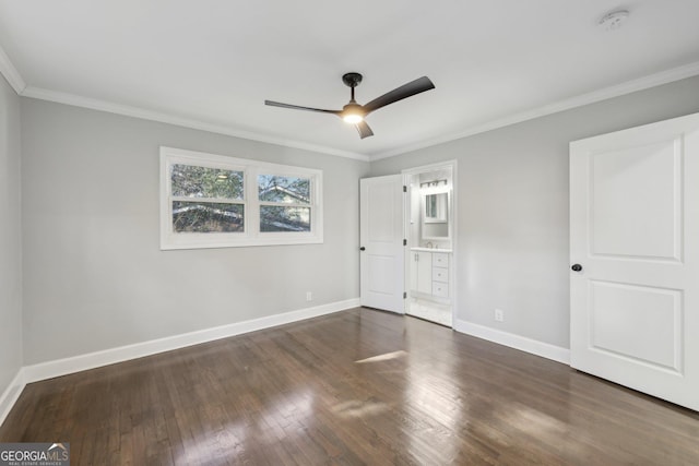 unfurnished bedroom with dark wood-type flooring, ensuite bath, ceiling fan, and ornamental molding