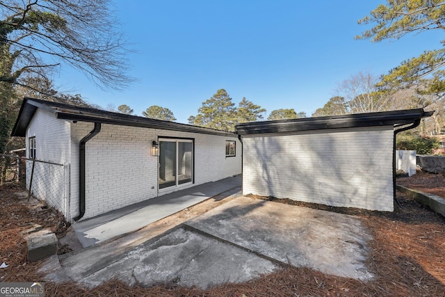 rear view of house with a patio area