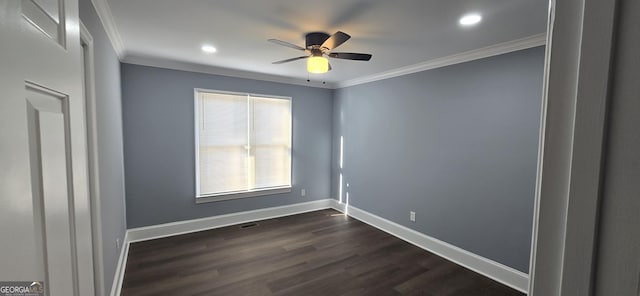 empty room with dark hardwood / wood-style flooring, ceiling fan, and ornamental molding