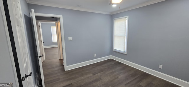 unfurnished room featuring dark hardwood / wood-style flooring, ceiling fan, and crown molding