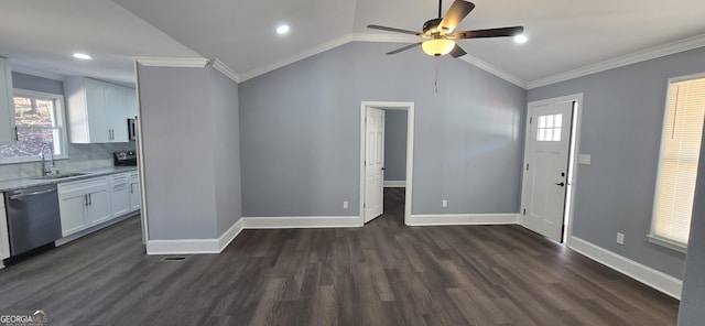 unfurnished living room featuring ornamental molding, vaulted ceiling, dark wood-type flooring, and sink