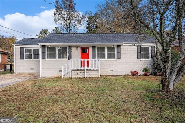 single story home featuring a front lawn