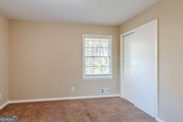 view of carpeted empty room