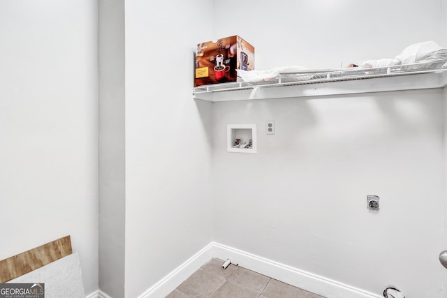 laundry area featuring hookup for a washing machine, light tile patterned floors, and hookup for an electric dryer