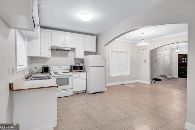 kitchen with white cabinetry, sink, hanging light fixtures, a notable chandelier, and white appliances