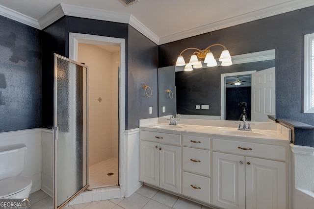 bathroom with toilet, a shower with shower door, and ornamental molding