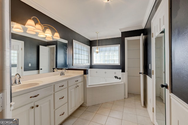 bathroom featuring tile patterned floors, vanity, a relaxing tiled tub, and ornamental molding