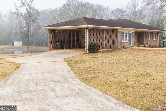 single story home with a carport and a front yard