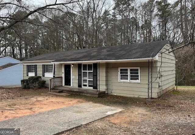1471 Cedar Creek Ln, Riverdale, GA 30296 - ranch-style home with roof with shingles and covered porch