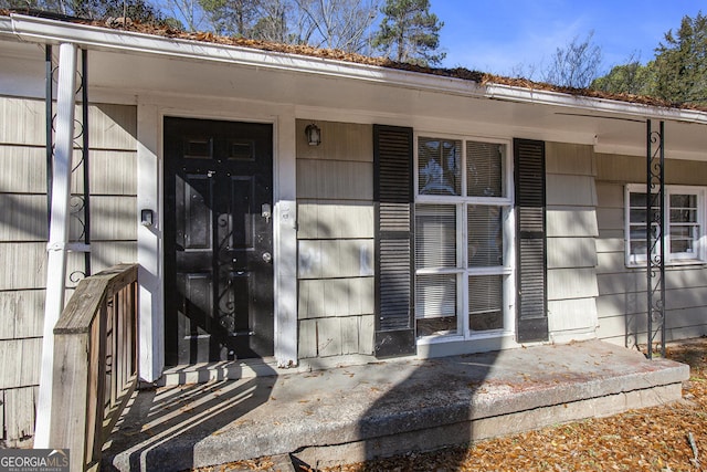 1471 Cedar Creek Ln, Riverdale, GA 30296 - property entrance with a porch