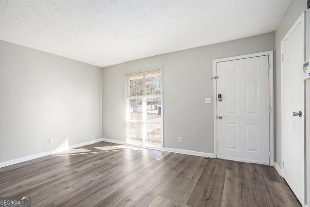 1471 Cedar Creek Ln, Riverdale, GA 30296 - entryway with wood finished floors and baseboards