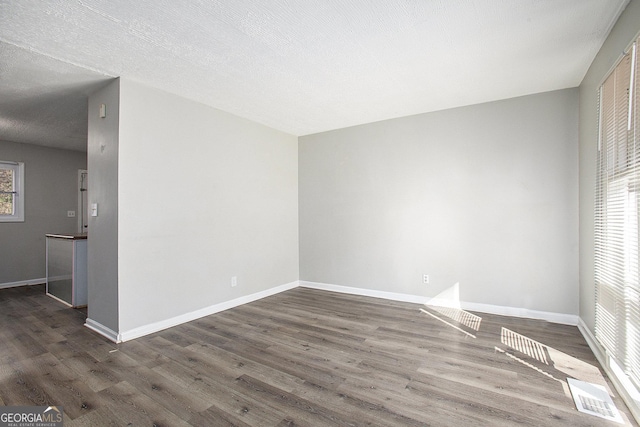 1471 Cedar Creek Ln, Riverdale, GA 30296 - spare room featuring wood finished floors and baseboards