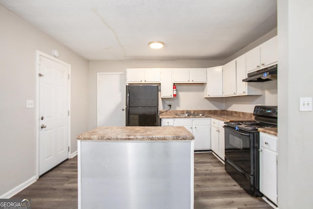 1471 Cedar Creek Ln, Riverdale, GA 30296 - kitchen featuring black appliances, under cabinet range hood, white cabinetry, a kitchen island, and dark wood-style floors