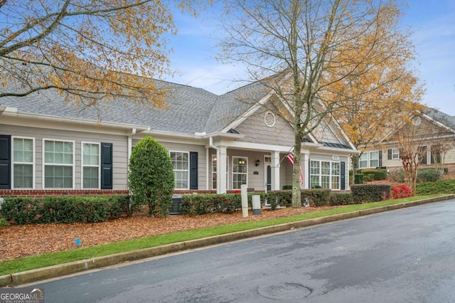 view of front of house featuring central AC unit