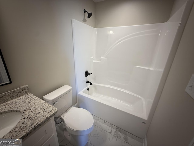 full bathroom featuring marble finish floor, vanity, shower / tub combination, and toilet