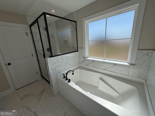 full bath featuring recessed lighting, marble finish floor, a marble finish shower, and a bath