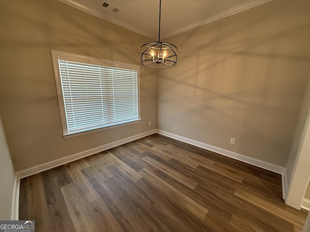 unfurnished dining area with baseboards, visible vents, and ornamental molding