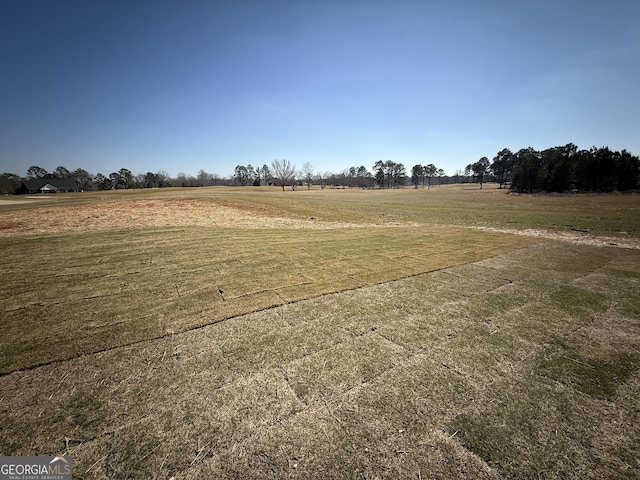 exterior space with a rural view